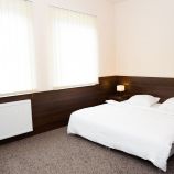 hotel wenus szczecin zachodniopomorskie pokój sypialnia łóżko